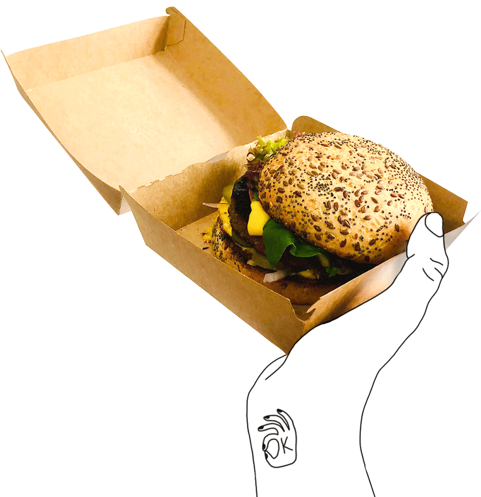 Hand holding a burger